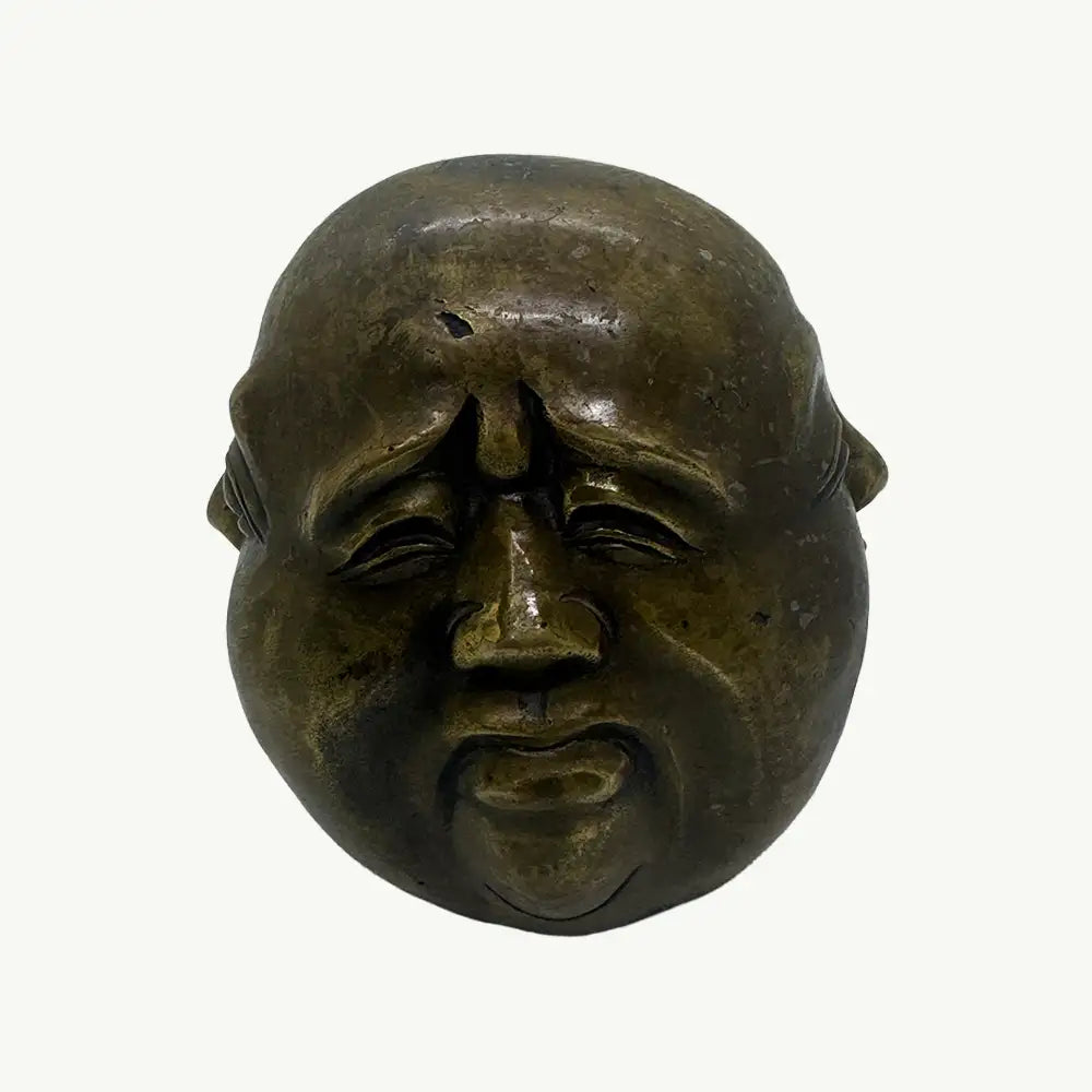 Set of Three Brass Expressive Face Sculptures