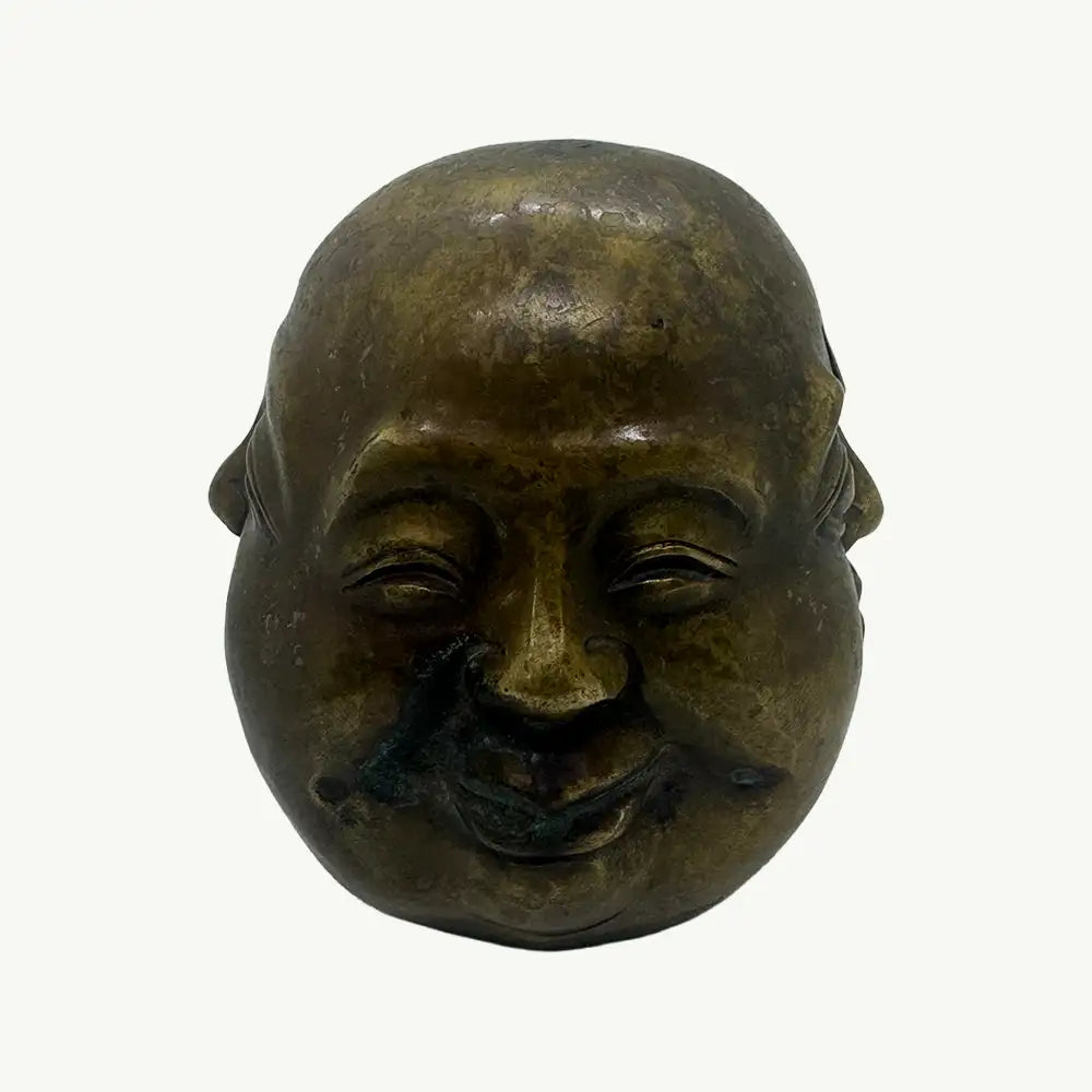 Set of Three Brass Expressive Face Sculptures